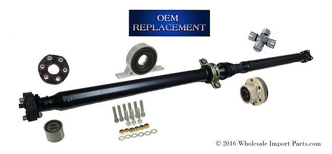 Driveshaft Assembly Explored With its Individual Components, a CV Joint, Center Support Bearing and Universal Joint.